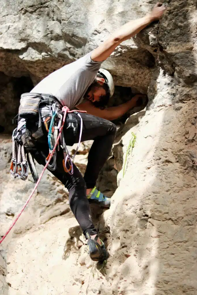 a rock climber descending